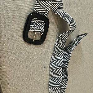Summer staple. Versatile woven black and white belt with black patent buckle